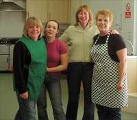 Ladies manning tea/coffee bacon rolls services